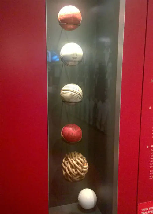 Different cricket balls used during the history of cricket, in a display at the Bradman Museum