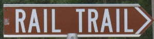 Brown sign for Rail Trail