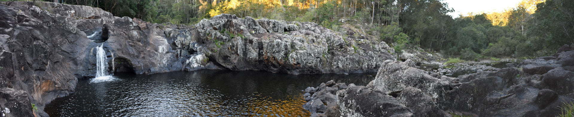 Panorama view of the waterfall and waterhole at Wappa Falls in Yandina