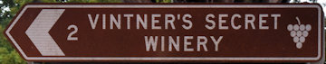 Brown sign for Vintners Secret Winery