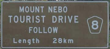 Brown sign for Mount Nebo Tourist Drive, Follow 8, Length 28km