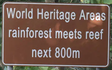 Brown sign for World Heritage Area Rainforest meets Reef, next 800m