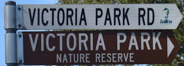 Brown sign for Victoria Park Nature Reserve, white sign for Victoria Park Rd