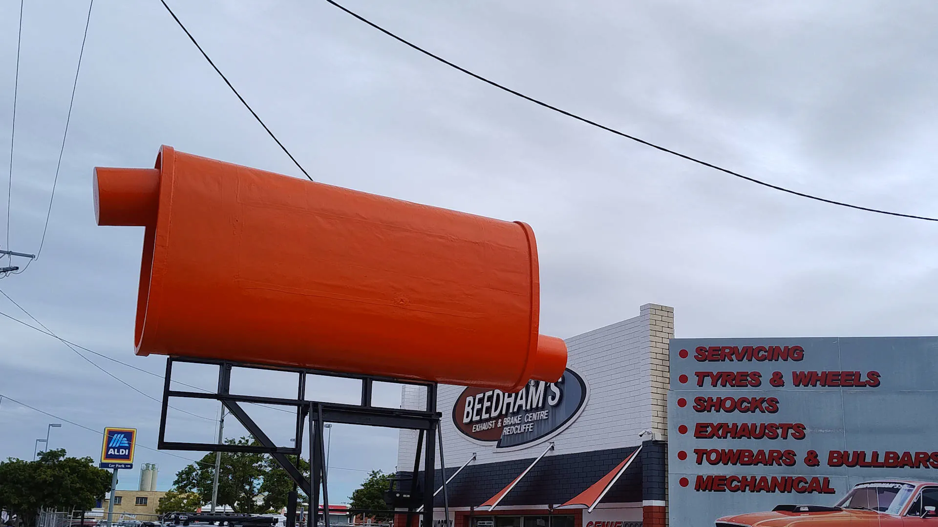 The Big Muffler at Kippa-Ring in Redcliffe, painted orange during restoration in 2024